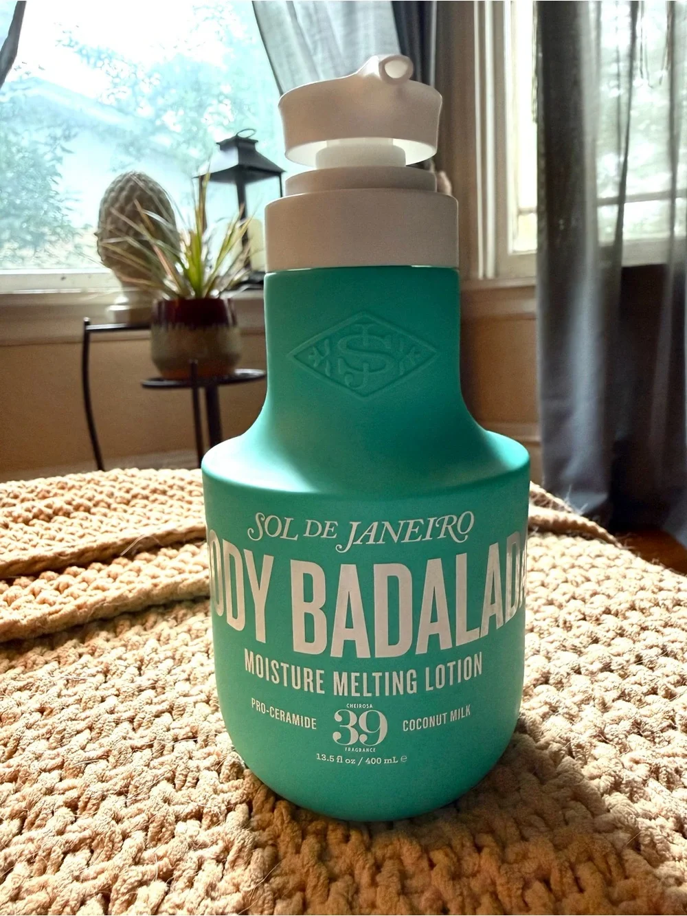 Sol de Janeiro Moisture Melting Lotion — Teal and White Bottle